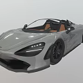Silver Convertible Sports Car Featuring Orange Interior Black Wheels And Sleek Design