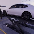 White Car Being Serviced On Hydraulic Lift In Auto Repair Garage