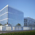 Modern Office Building Exterior With Glass Curtain Wall Greenery And Clear Blue Sky