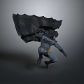 Man In Batman Costume With Flowing Cape Leaping In Dynamic Action Pose