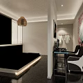 Hotel Room Interior With Round Bed Pink Red Tones Decorative Walls And Patterned Carpet