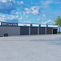 MAN Truck And Bus 4S Dealership With Garage Doors And Parked Vehicles