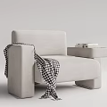 Light Gray Single Sofa With Black White Checkered Blanket And Side Table With Books 3d model