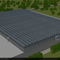 Large Industrial Factory Building With Blue Roof Metal Structure Surrounded by Trees and Modern Design