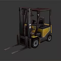 Yellow And Gray Industrial Forklift With Front Forks And Driver Cab