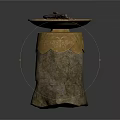 Stone Pedestal With Brass Bowl Filled With Black Charcoal Pieces And Ornate Gold Carvings On Base