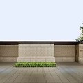 Modern Entrance Gate with Brick Wall and Lush Shrubs Along Illuminated Driveway