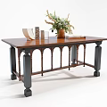 Wooden Dining Table With Arched Black Legs And Decorative Vase Flower Bouquet