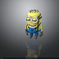 Minion Character With Yellow Body Blue Overalls Large Goggles Black Spiky Hair And Grinning Expression