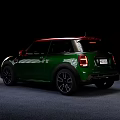 Green MINI Stylish Compact Car With Red Roof And Black Alloy Wheels