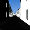 Ancient Architecture Alley With Stone Paved Path White Walls And Windows