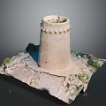 Ancient Stone Cylindrical Tower With Earth Toned Exterior Sandy Base And Green Vegetation