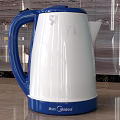 Midea Daily Use Electric Kettles in Blue White and Black on Kitchen Countertop