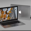 Silver Apple Laptop Open And Closed Featuring Screen With Autumn Leaves Building And Desktop Icons