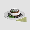 Delicious Chocolate Cake With White Flower Decoration Green Leaves And Chocolate Shavings On White Plate