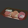 Fresh Pig Meat in Transparent Plastic Tray with Three Pieces and Label