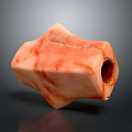 Unique Petrified Wood Craft With Natural Orange Red Patterns And Central Hole Design