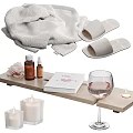 Bathroom Accessories With Towel Slippers Toiletries Rose Book Wine Glass And Candles On Tray