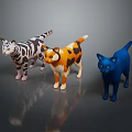 Three Colorful Cat Figurines With Striped Calico And Blue Patterns On Grey Surface