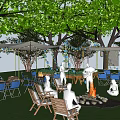 Scenic Campsite With Outdoor Fire Pit People Sitting Around Wooden Chairs And Trees
