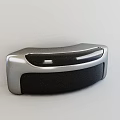 Modern Sleek Bar Counter With Silver And Black Curved Surface Design