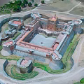 Historic Castle Aerial View With Fortified Walls Towers And Central Courtyard