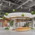 Modern Shopping Mall Lobby Interior With Circular Counter And Green Plants
