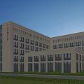 Modern White Multi Storey Hospital Building With Large Windows And Surrounding Greenery