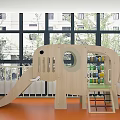Kindergarten Indoor Play Space With Wooden Slide Climbing Structure And Orange Floor