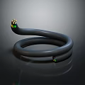 Gray Snake Like Decorative Object With Colorful Spheres On Both Ends