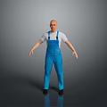 Bald Headed Man in White T shirt and Blue Overalls Standing in Gray Background