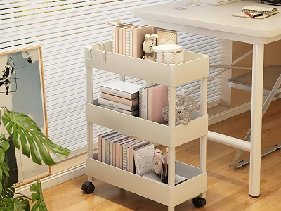 White Desk With Rolling Storage Cart Books Stuffed Toy And Green Plant 3d model