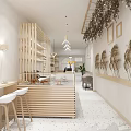 Modern Milk Tea Shop Interior With Wooden Bar Counter Stools And Pampas Grass Decorations