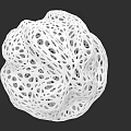 Intricate White Perforated Spherical Sculpture With Hollow Design Details