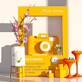 Commercial Outdoor Setup With Yellow Photo Frame Pink Flower Branches Yellow Camera And Welcome Sign