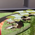 Modern Outdoor Landscape Space With Circular Green Canopies Grassy Area And Pathway