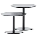 Modern Round Coffee Tables With Textured Surface And Black Cylindrical Base 3d model