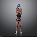 Active Woman Lifting Blue Dumbbells Over Head In Sport Bra And Shorts