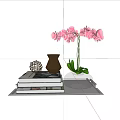 Decorative Ornament Set with Pink Orchids Brown Vase Woven Sphere and Stacked Books on Tray