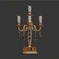 Elegant Ornate Golden Candelabra With Multiple Candles And Crystal Pendants