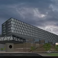 Modern Commercial Street Building With Glass Curtain Walls And Illuminated Evening Landscaping Trees