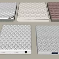 Various Mattresses With Quilted Diamond Patterns And Color Options Displayed
