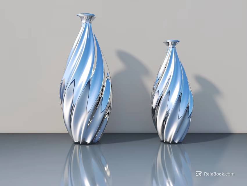 Two Silver Carved Sculpture Vases Featuring Wavy Patterns On Reflective Table 3d model