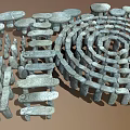 Spiral Stone Structure With Gray Natural Stones And Circular Arrangement Design