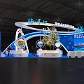 Wuhekou National Winter City Exhibition Booth With Blue Curved Structure And Model Tree