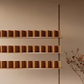 Modern Lounge Room Interior With Multi tiered Wooden Shelves And Dried Branch Decor