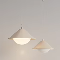 Two Modern Beige Cone Shaped Pendant Lights With White Globe Shades In Minimalist Interior