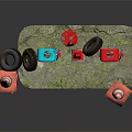 Vintage Blue And Red Fuel Pumps With Rusty Tire And Traffic Cones On Stone Base