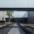Contemporary Modern Building With Skylight Roof Glass Facade And Greenery