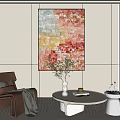 Modern Minimalist Living Room Interior With Round Coffee Table Vase Books And Colorful Painting